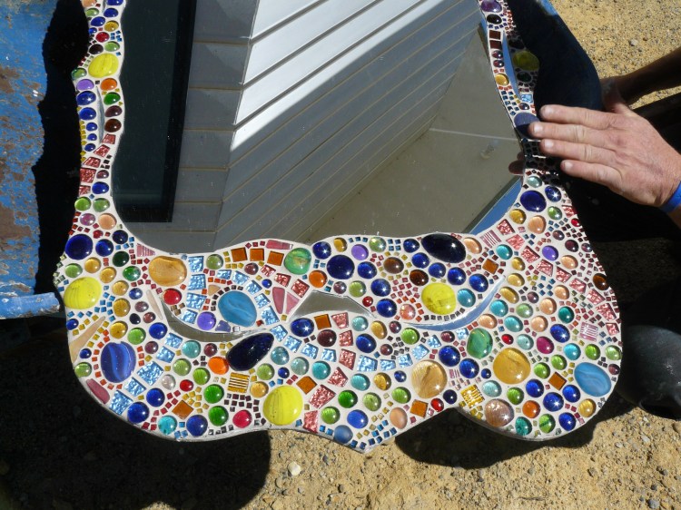 This shot shows the close up detail of the bathroom mirror, Bryon spent hours tiling it, using tweezers for the smallest tiles!!